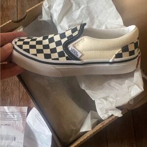 Vans black and White Checkerboard Slip-Ons